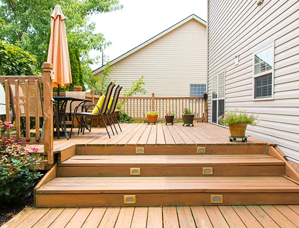 Custom-designed deck construction in Quitman, GA, including pool decks, porches, and pressure-treated wood options.